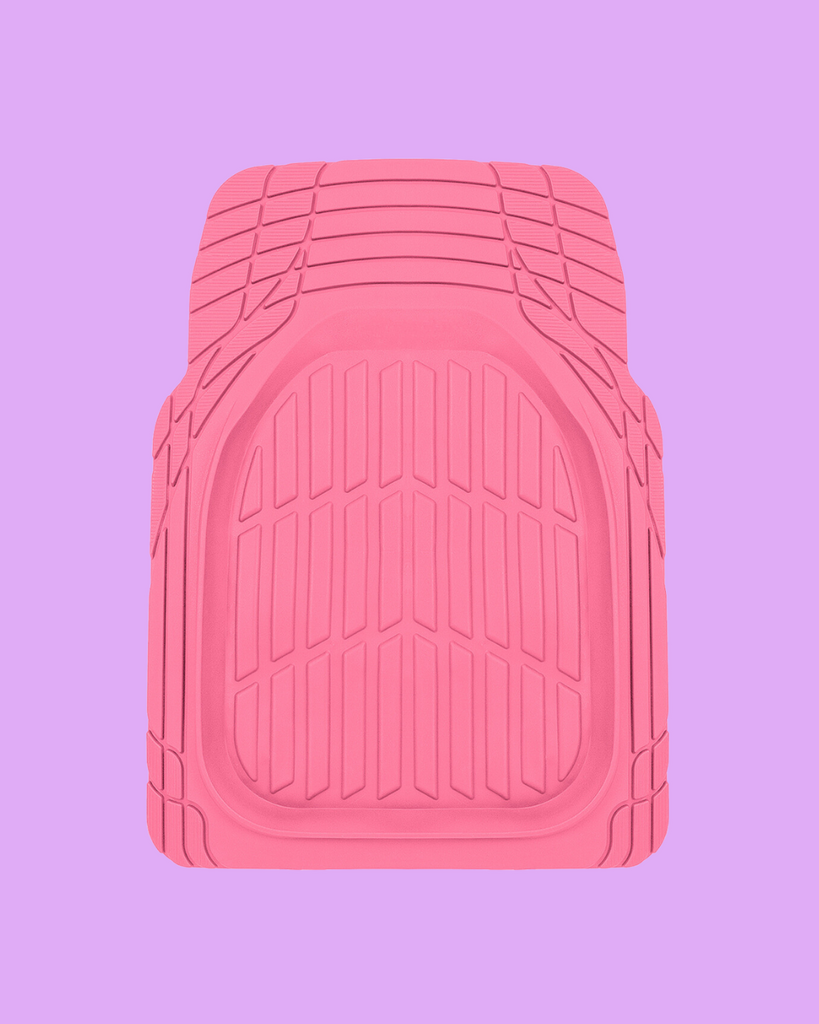 pink rubber car floor mat on purple background